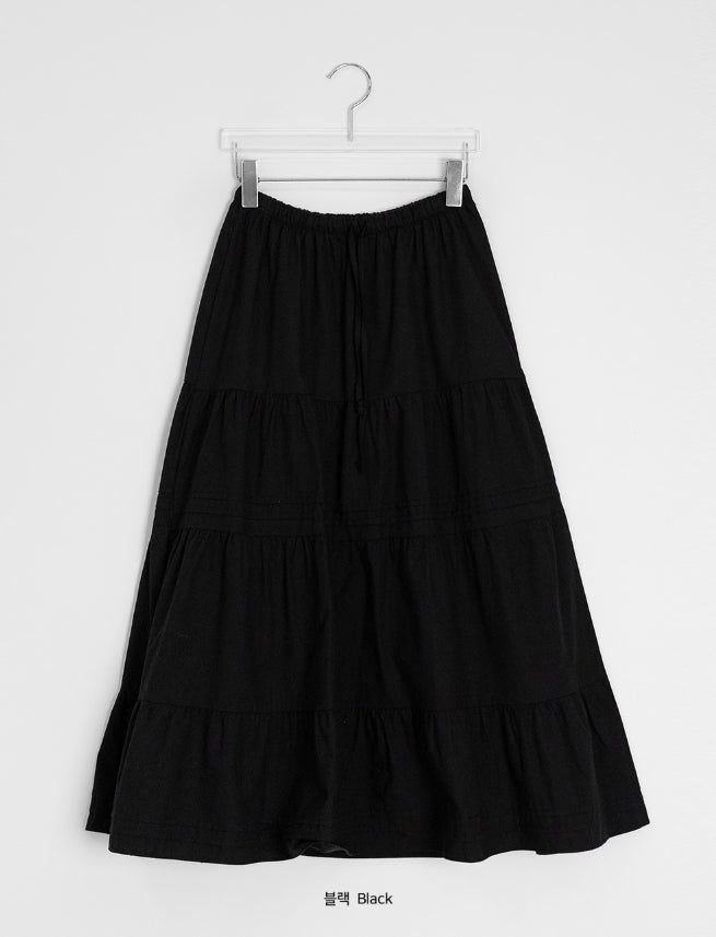 Nayuta Pintuck Tiered Banding Long Skirt