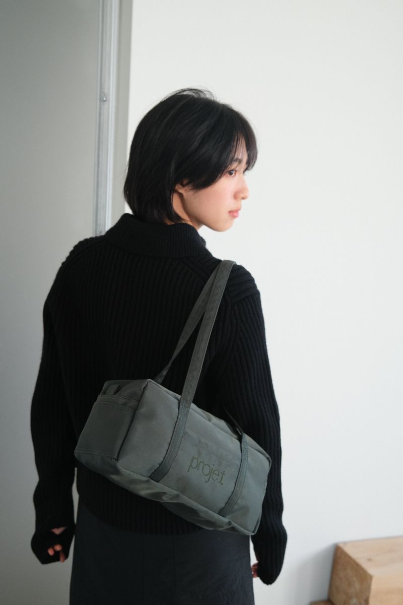projet（プロジェ）の「compact duffle bag (deep green)（Bags）」