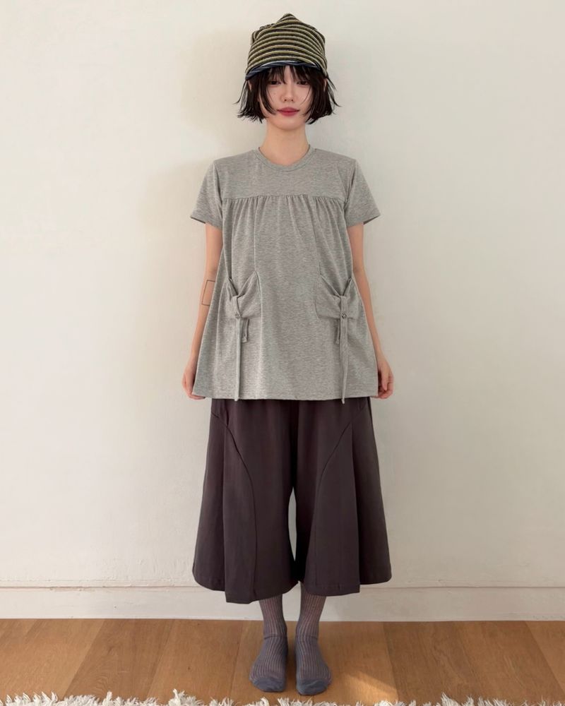 fungus(ファンガス)の「Button Pintuck Tee (2colors)(Tops)」