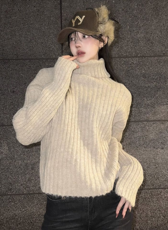 EEUN（イウン）の「Cozy high-neck over knit（Tops）」