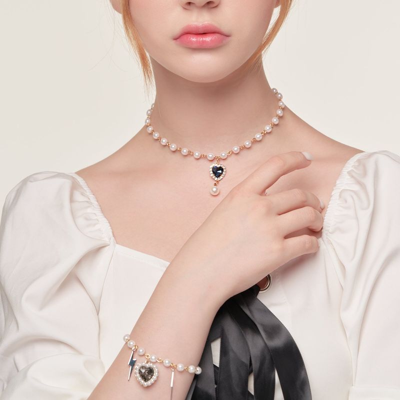 SAPPHIRE HEART NECKLACE