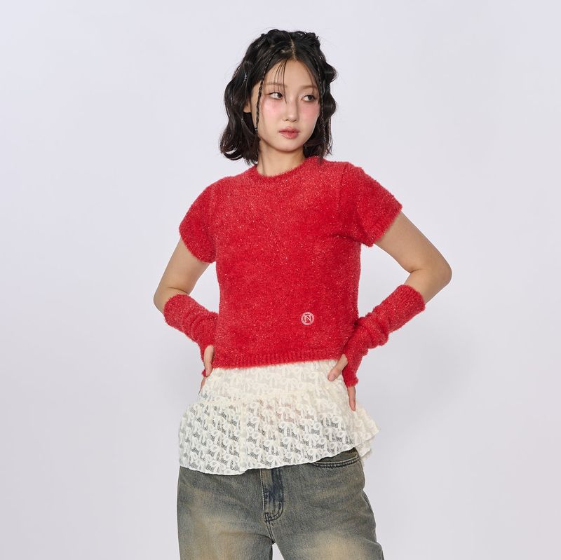 UNUSUALNORMAL（アンユージュアルノーマル）の「SPARKLE SYMBOL KNIT TOP_RED (WARMMER X)（Tops）」