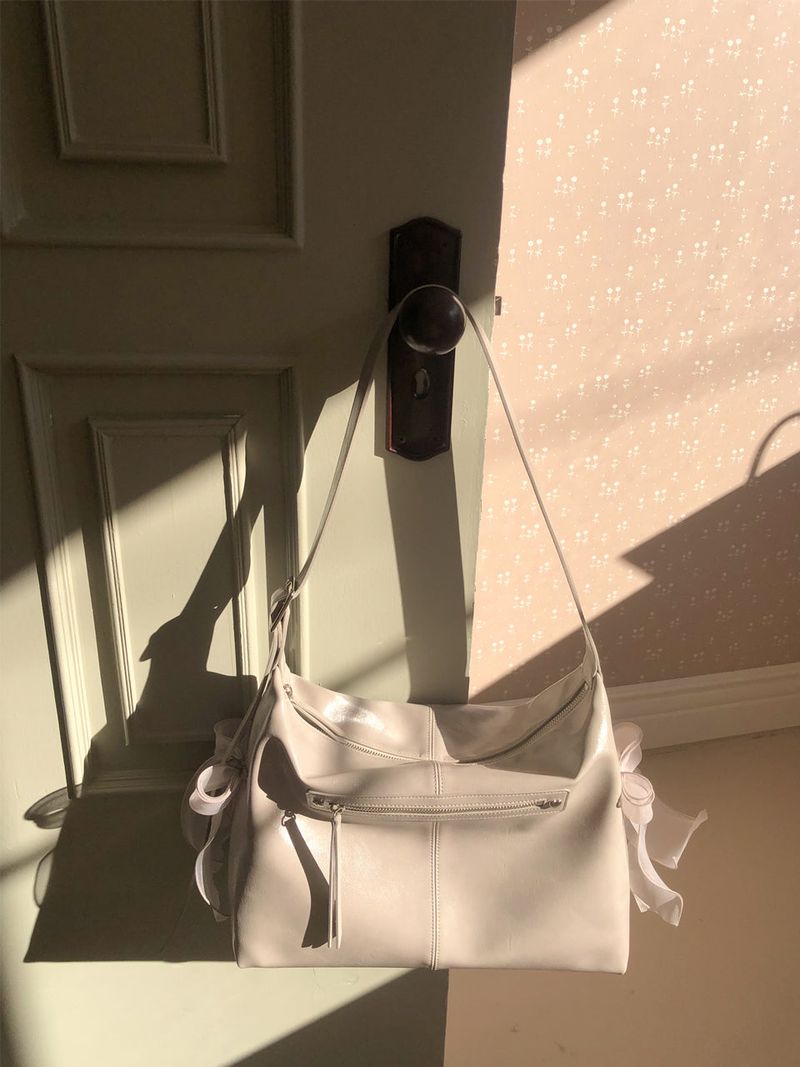 ovuni（オーブニ）の「Pillow ribbon bag_warm grey（Bags）」