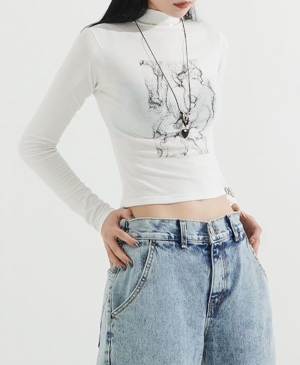 KIXI（キッシー）の「Half Turtleneck Sandy Slim-fit Crop LS Top（Tops）」