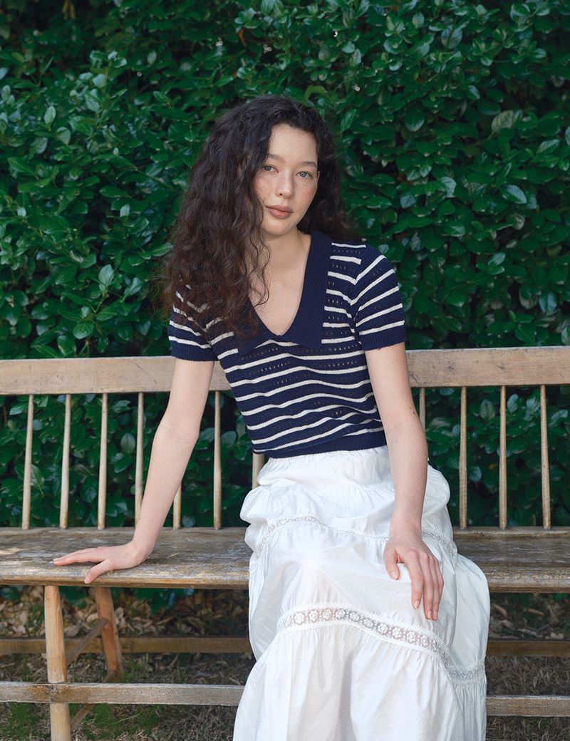 ORIGHH(オライ)の「Stripe Deep V Collar Knit Top_Navy(Tops)」