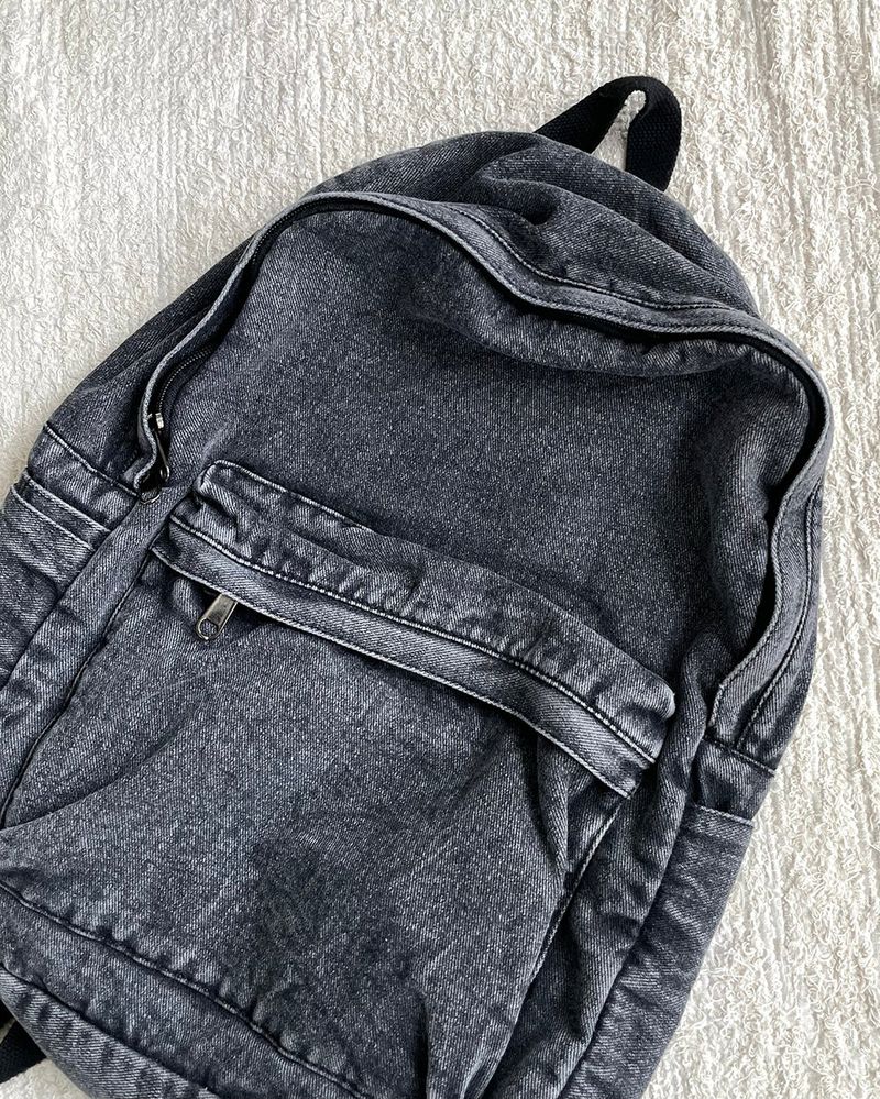 Washed denim backpack