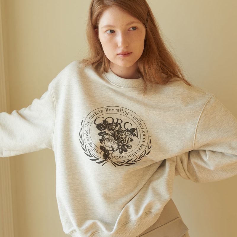 CORCA（コルカ）の「Rose Graphic Sweat Shirts Oatmeal（Tops）」