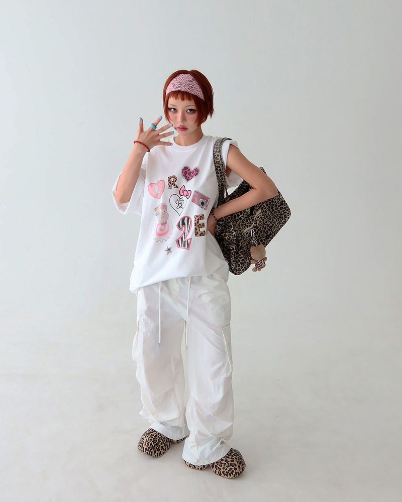 Delight-J（ディライトジェイ）の「キッチンY2Kキャットオーバーサイズフィットボクシー半袖Tシャツ（トップス）」