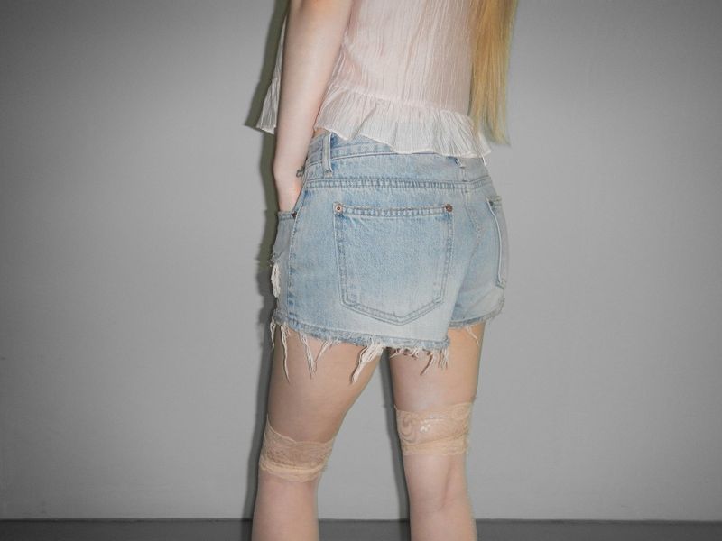 orange destroyed shorts