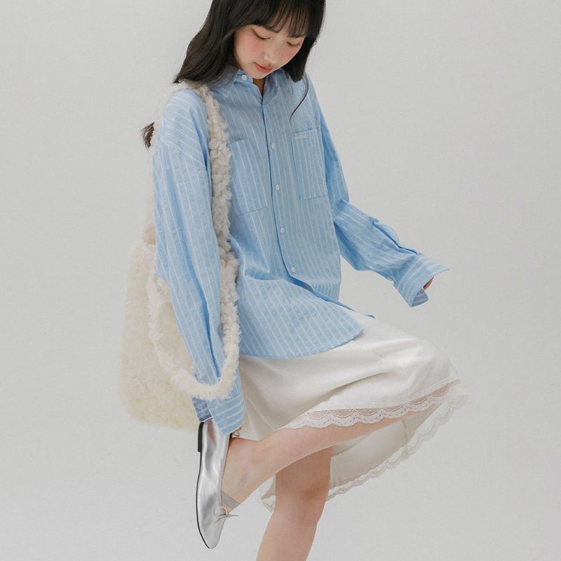 mellotory（メロートリー）の「TWO POCKET STRIPE SHIRT (LIGHT BLUE)（Tops）」