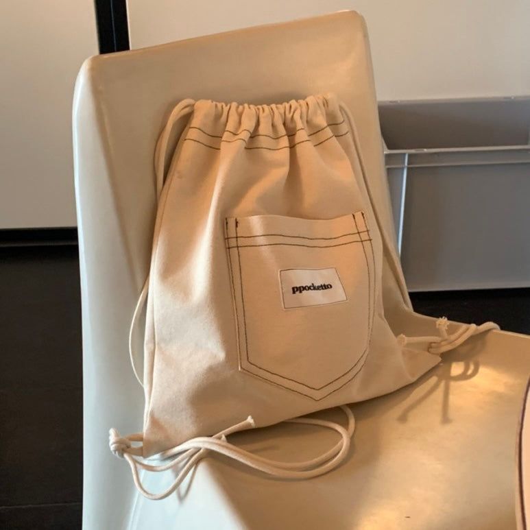 ppocketto ivory string bag