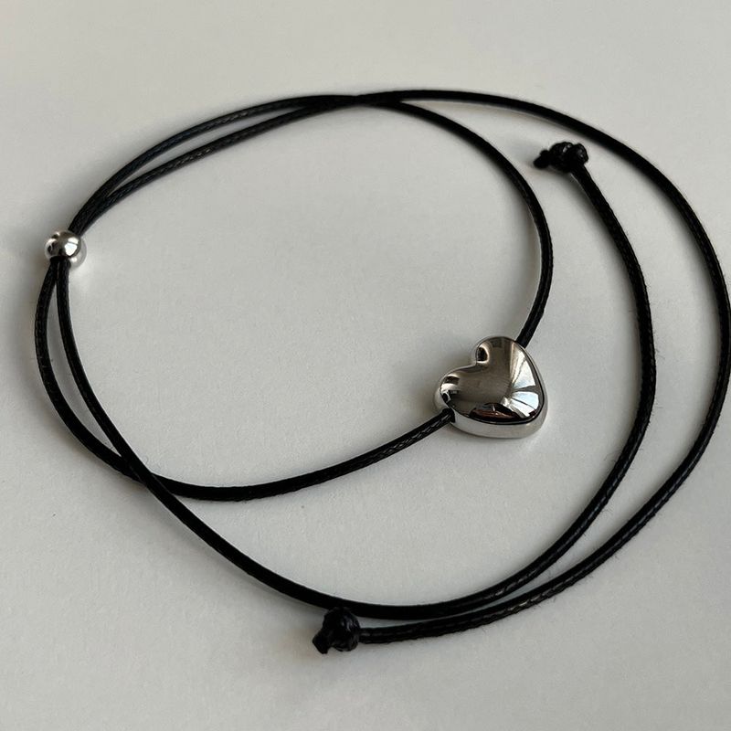 String heart necklace
