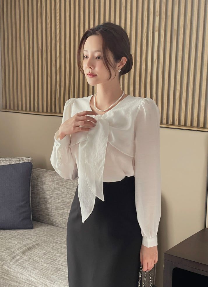 iam mari（アイアム マリ）の「Marron Volume Ribbon Puff Blouse（Tops）」