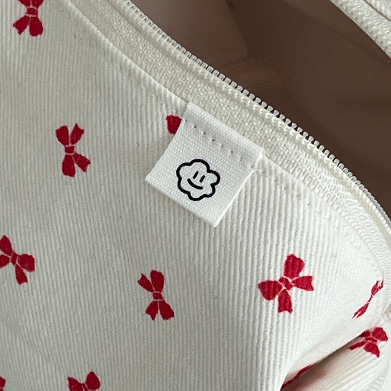RED RIBBON ZIPPER POUCH