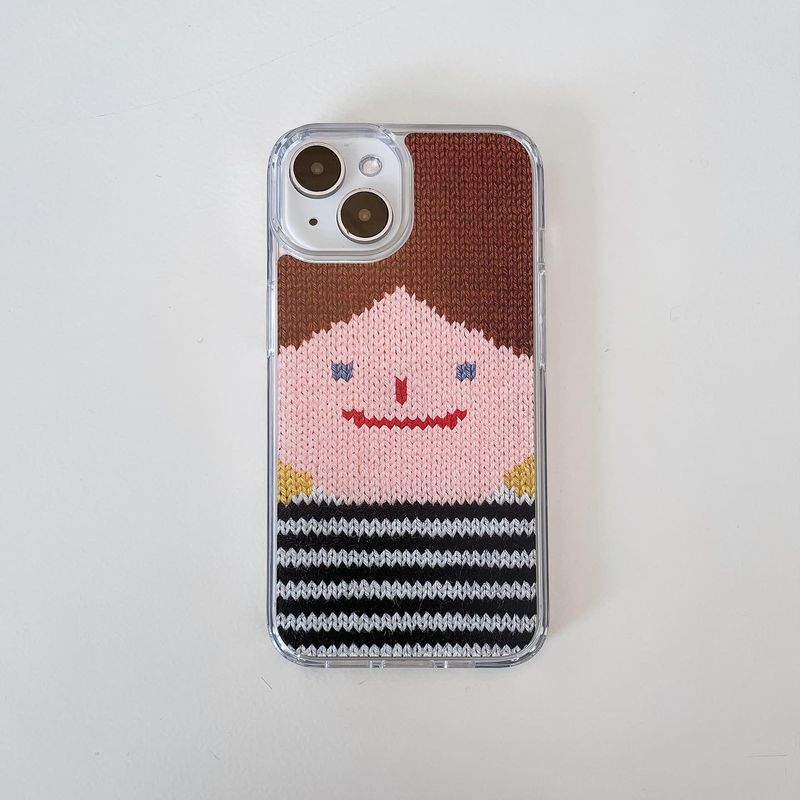 DELPHIN(デルフィン)の「スマイリーフェイスハードジェルケース (+ヘアキーリングセット)_BROWN(スマホグッズ/小物)」