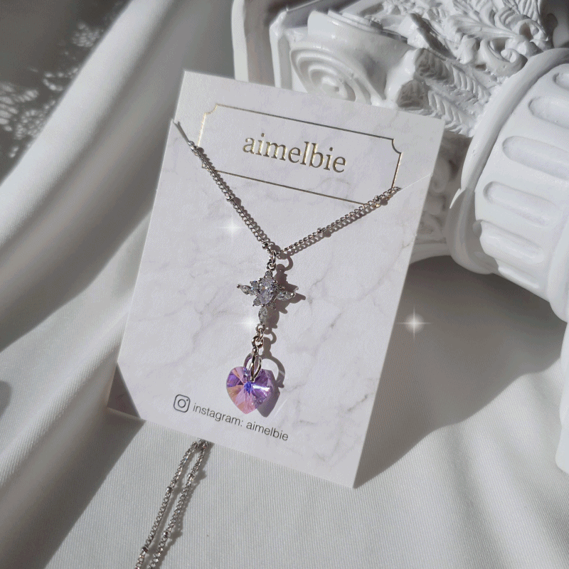 aimelbie（アイメルビー）の「Angelic Heart Crystal Necklace - Violet（Accessories）」