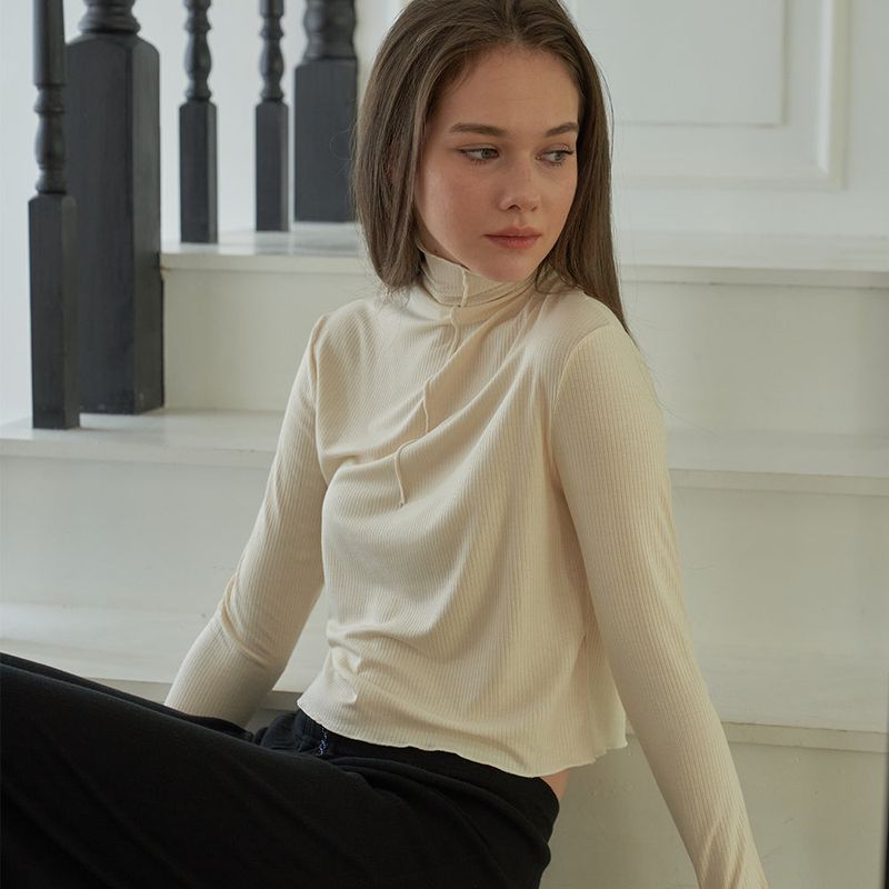 OVT-U(オーブイティーユー)の「High Neck Long Sleeve Top(Tops)」