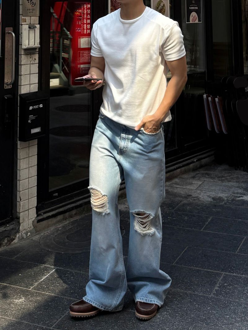 Curred destroyed flare denim pants