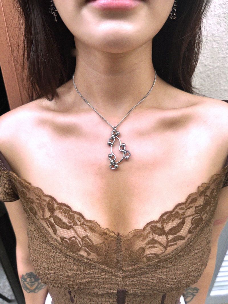 BUZZERBE（ブザービー）の「Adinkra Symbol Peace Making Chain Necklace (size: 2type)（Accessories）」