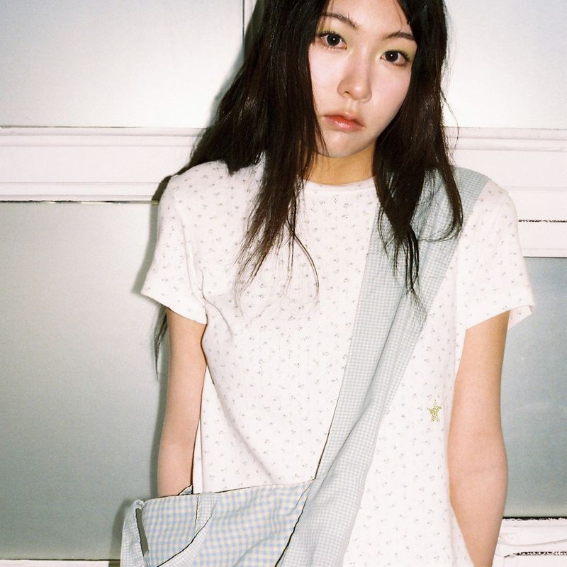 WEBHOUSE（ウェブハウス）の「Twister Star Angel Tee - Flower Ivory（Tops）」