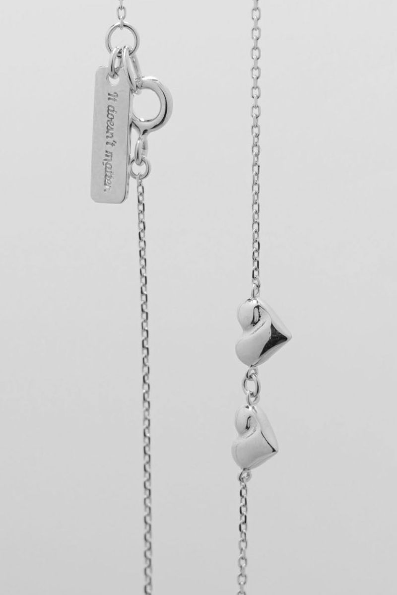Two heart symbol necklace