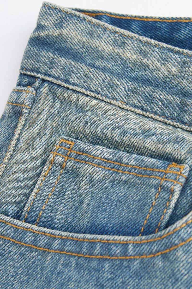 Distressed Patchwork Studded Jeans