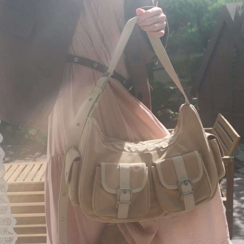 cozing（コジング）の「Cuddle Hobo bag_beige（Bags）」