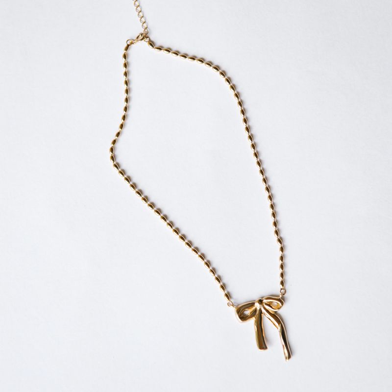 TOMAR（トマル）の「[MADE] リボンボールドネックレス (14k gold plated)（アクセサリー）」