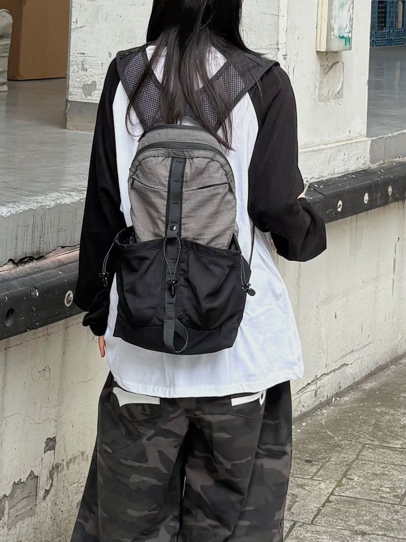 dual pocket mesh backpack
