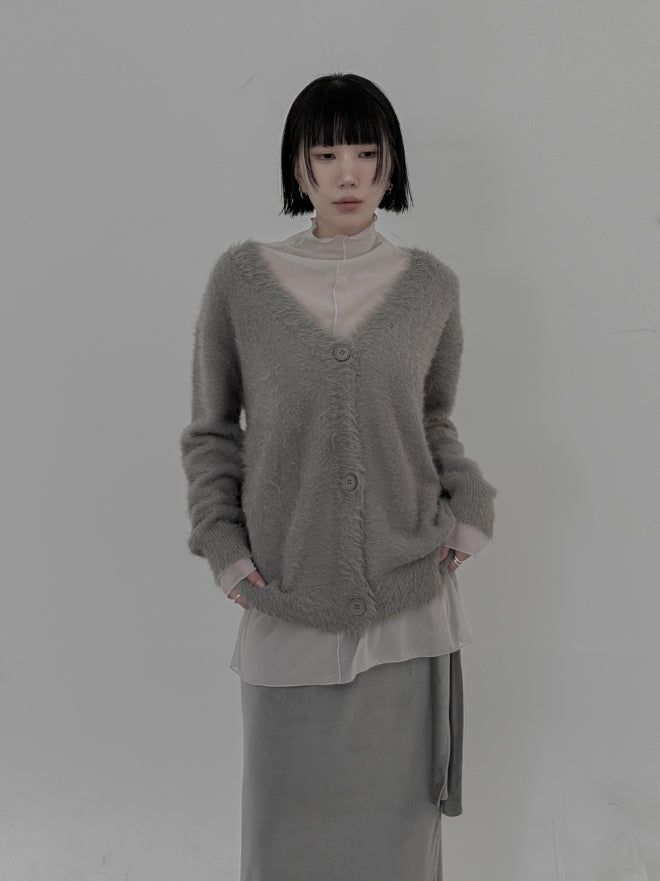 mnem（ムネム）の「Loose-fit V-neck fur cardigan（Tops）」