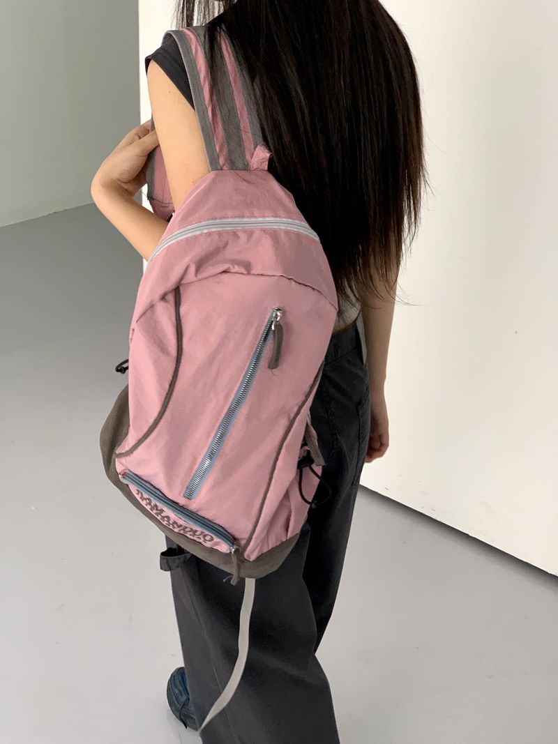 WONDER WONDER(ワンダーワンダー)の「Kaman Contrast Zipper Sporty Backpack(Bags)」