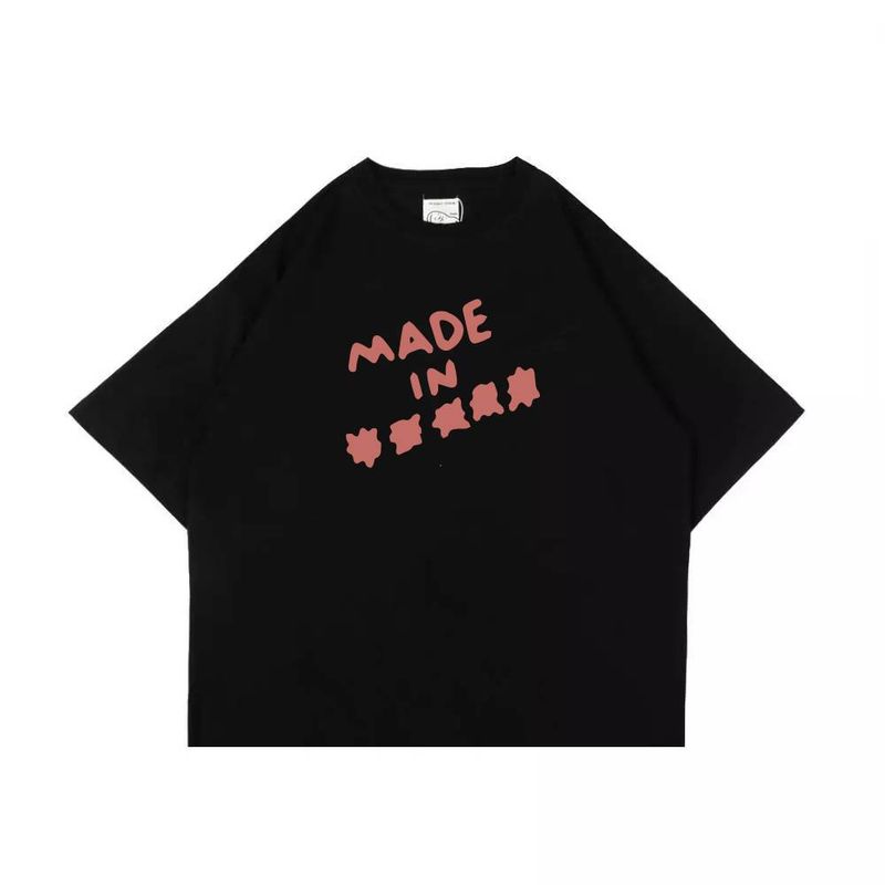 Peanut Stain（ピーナッツ ステイン）の「フェイクナッツ ステイン メイド イン アスタリスク ブラック ボクシー オーバーサイズ Tシャツ（トップス）」