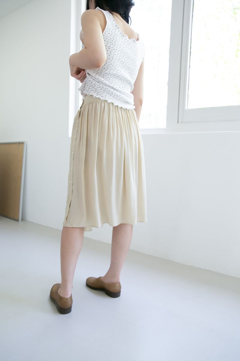 button layered flare midi skirt(2colors)