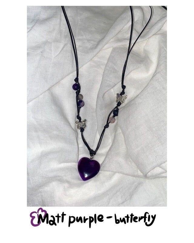 PINCUNOMARU(ピンクノマル)の「Matt purple - butterfly(Accessories)」