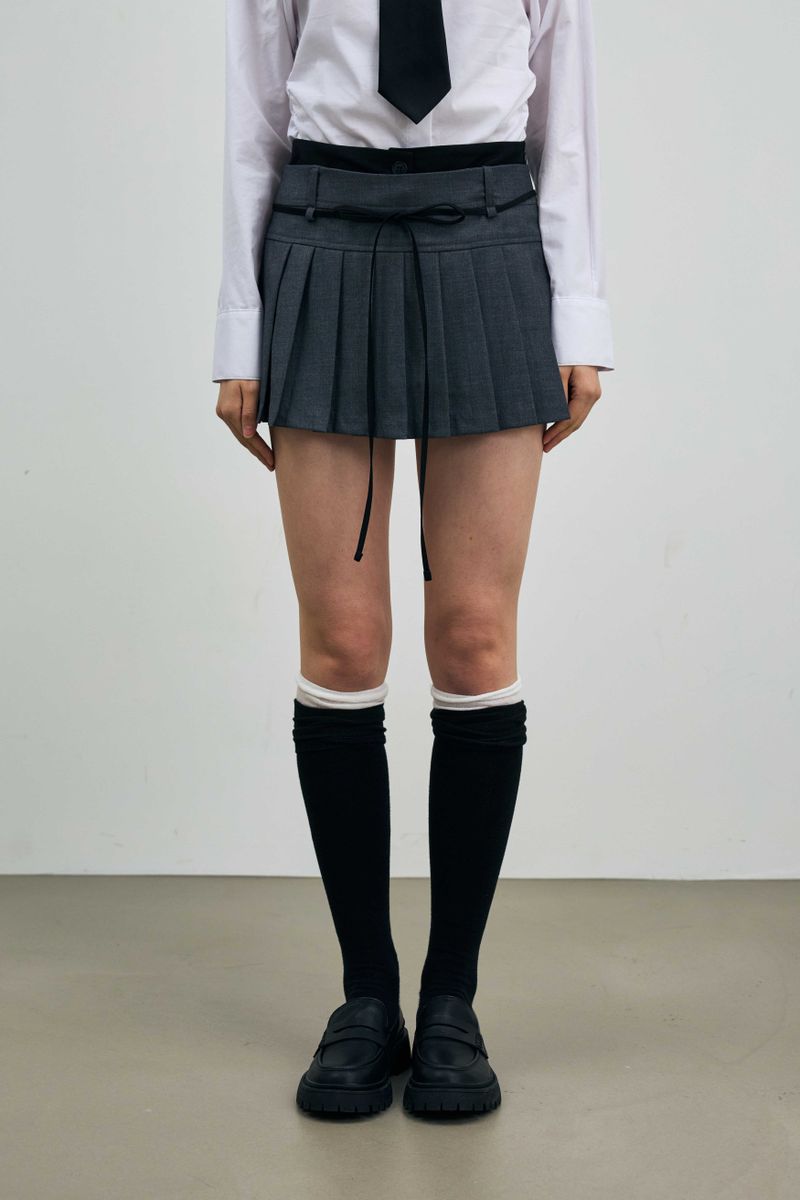 ARIKIM（アリキム）の「SCARLET PLEATS SKIRT PANTS / CHARCOAL（Skirts）」