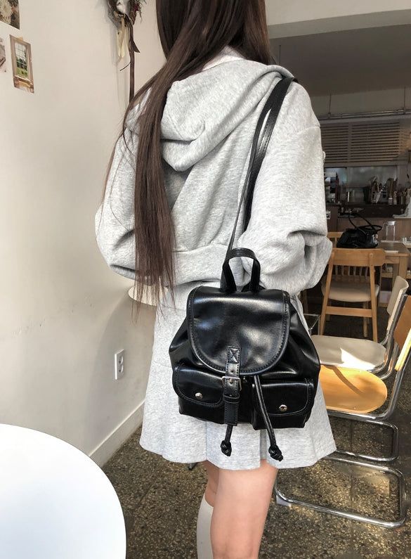 anyonemore（エニーワンモアー）の「Teoin Buckle Leather Pocket Mini Backpack（Bags）」