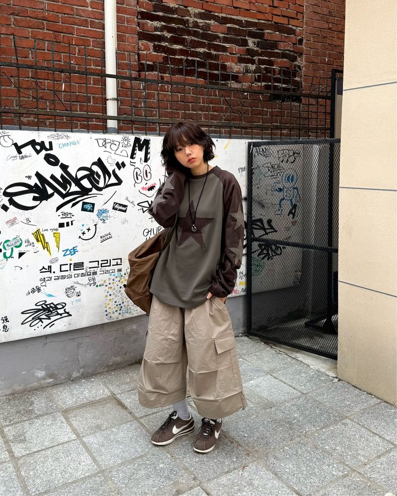 HundoP(ハンドピー)の「Vintage Star Contrast Raglan Long Sleeve Tee(Tops)」
