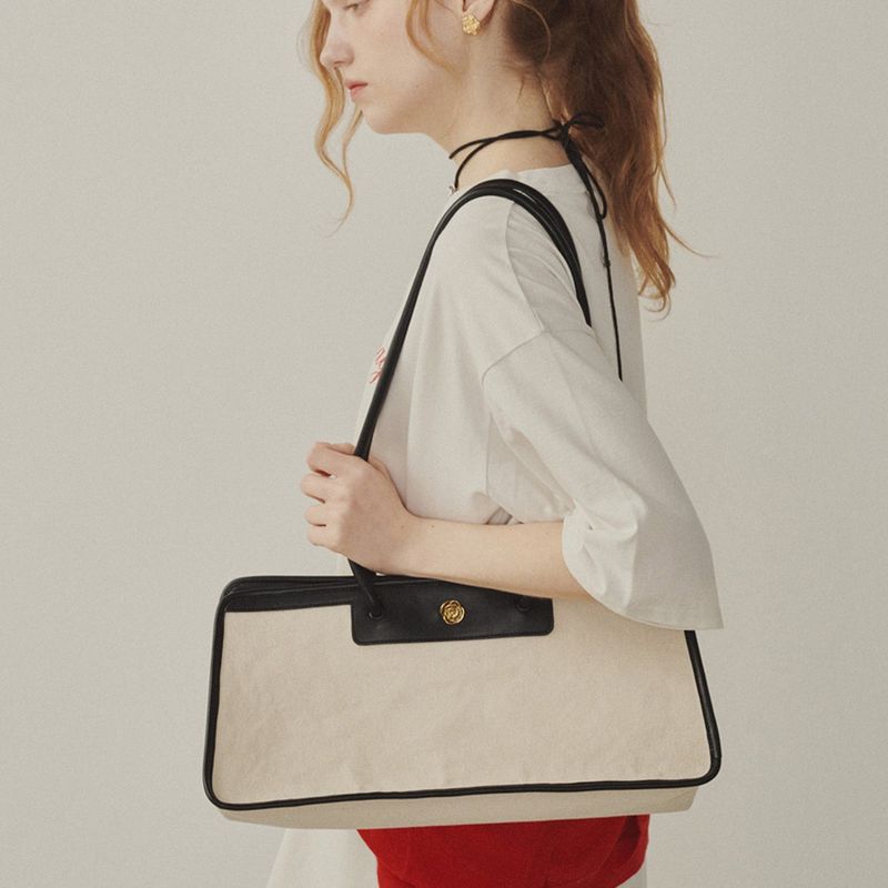 Melly&Rose(メリーアンドローズ)の「Signature Rose Canvas Bag(Bags)」