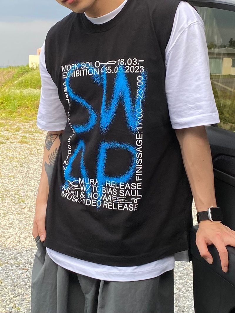 UNAIDUN(アネイダン)の「Spray Lettering Vest 3C(Tops)」