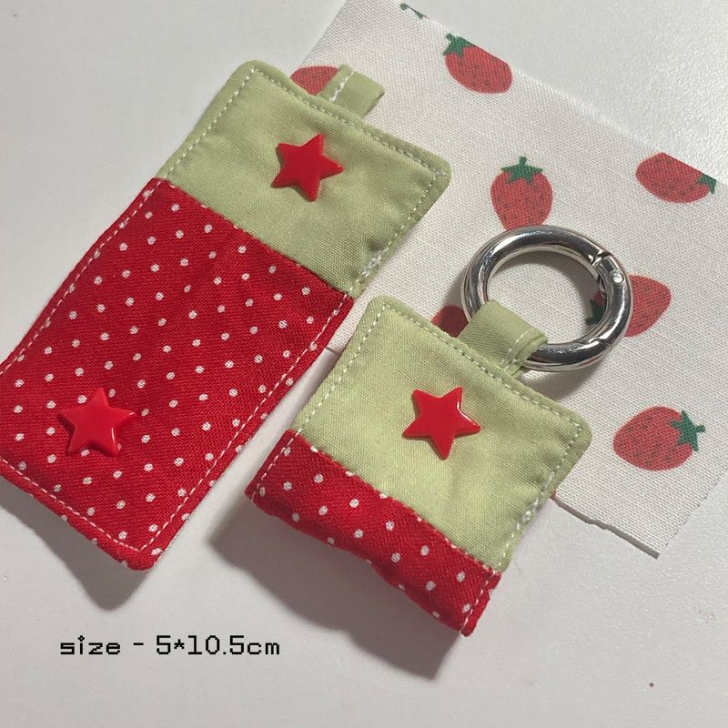 I like strawberries! Earphone holder
