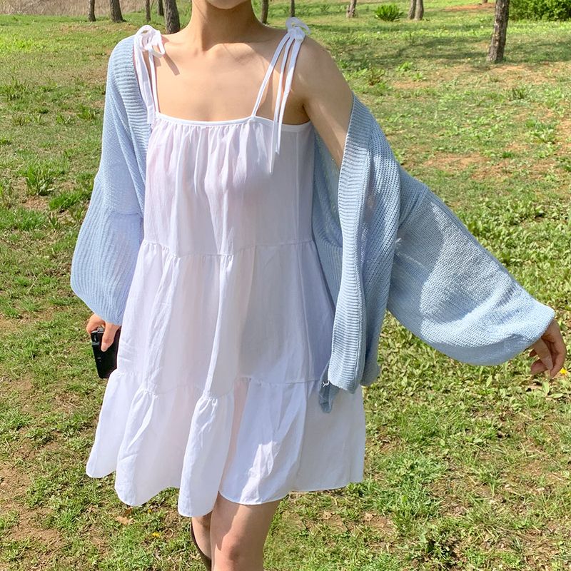 [Adjusting the strap] cancan sleeveless dress