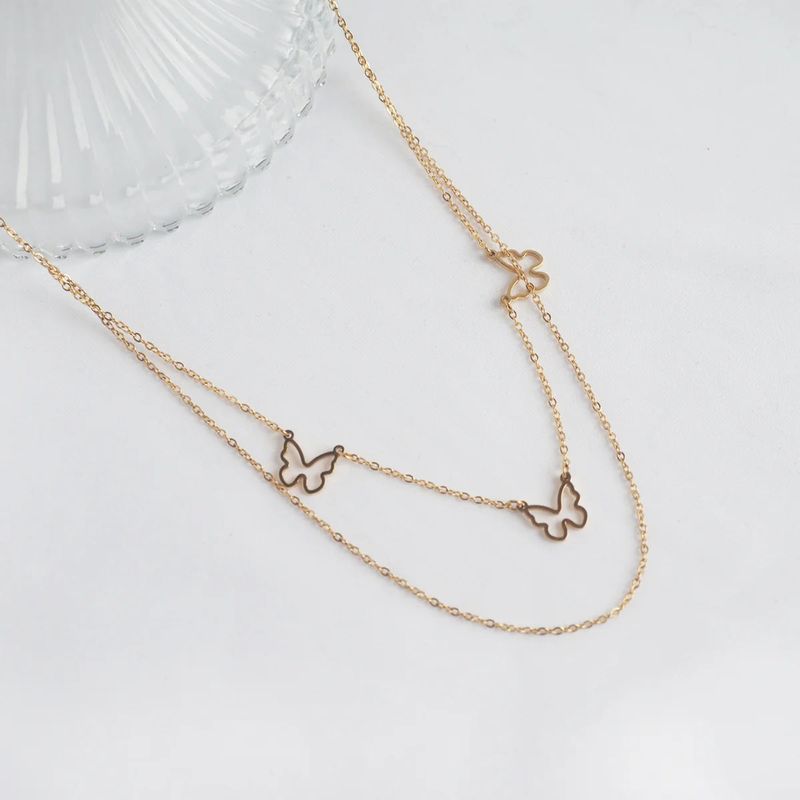 éclater（エクラテ）の「トリプルバタフライネックレス（アクセサリー）」