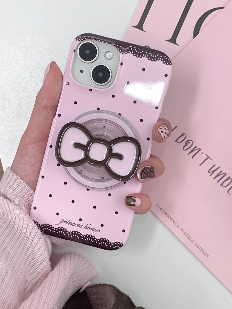 princess house（プリンセス ハウス）の「chocolate ribbon phone grip tok - magsafe（Smartphone Accessories）」