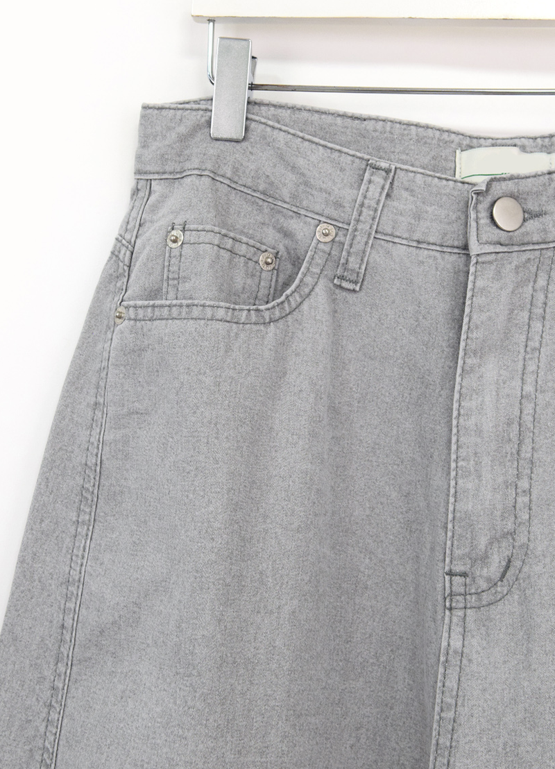 over wide gray pants