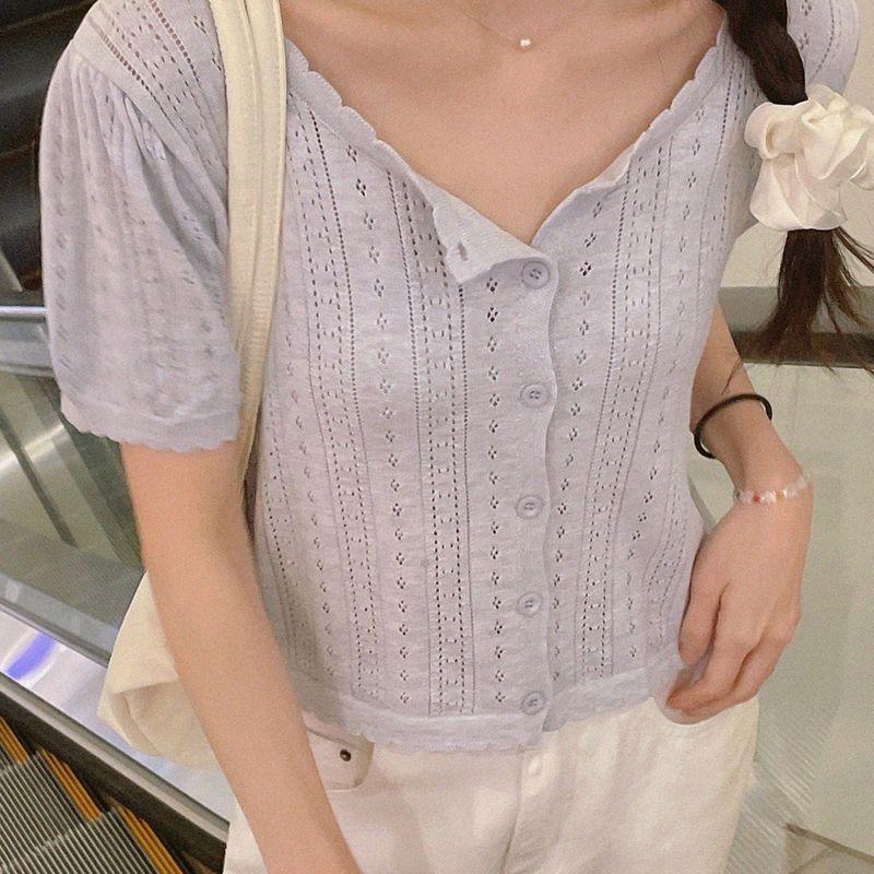natural mind（ナチュラル マインド）の「Latte Short-Sleeved Knit Cardigan（Tops）」