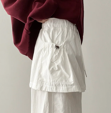 Log banding layered pocket skirt pants