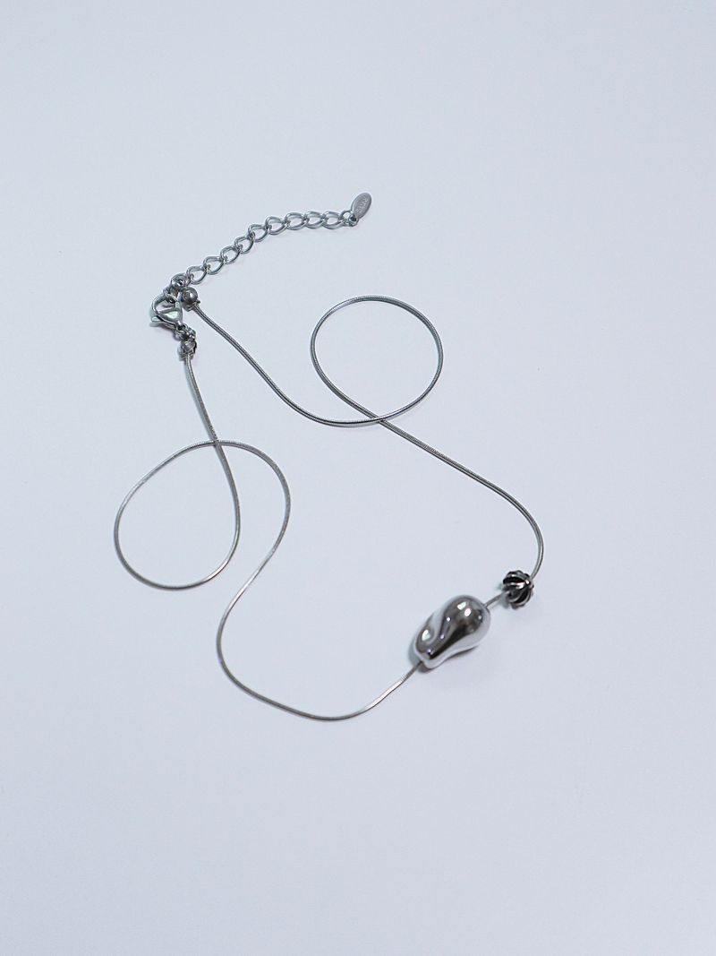 All surgical steel object cross necklace