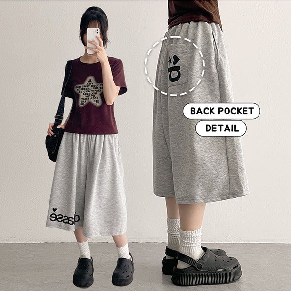 hijjoo（ハイチュー）の「クラス レタリング ショーツ スター ハート バミューダパンツ (2 colors)（パンツ）」