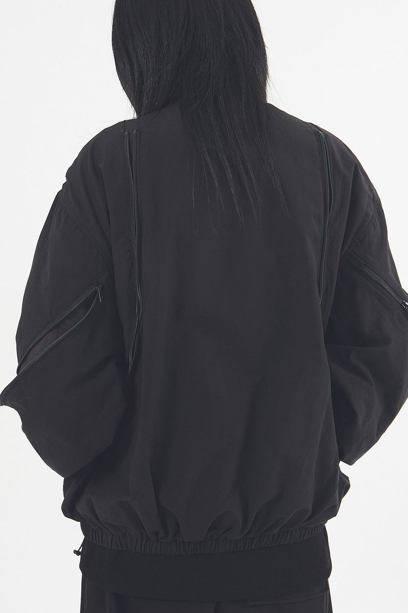 Multi curved line zip-up jumper