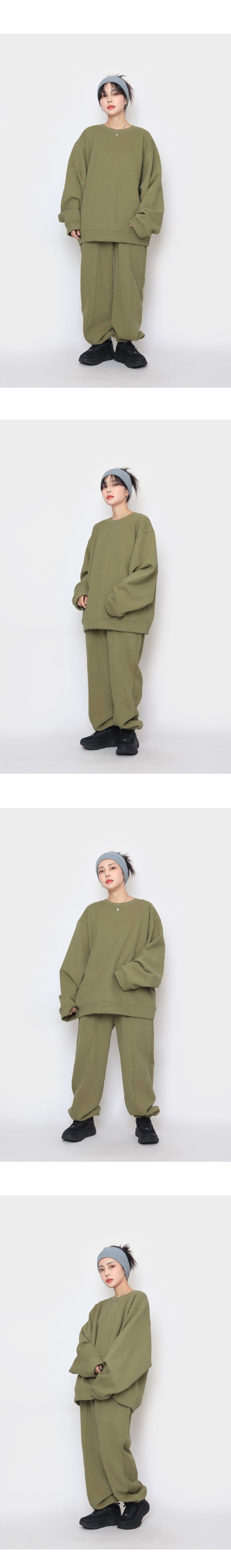 wool over peach sweatshirt